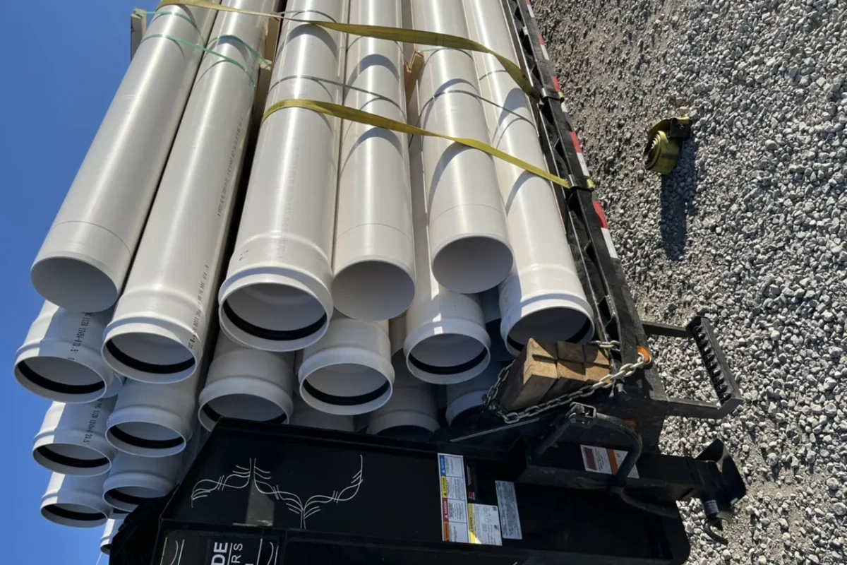 Bundles of irrigation pipe and fittings strapped for shipping